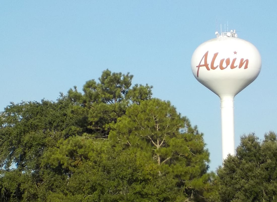 Alvin, TX - Aerial View of Alvin, TX Water Tower on a Sunny Day